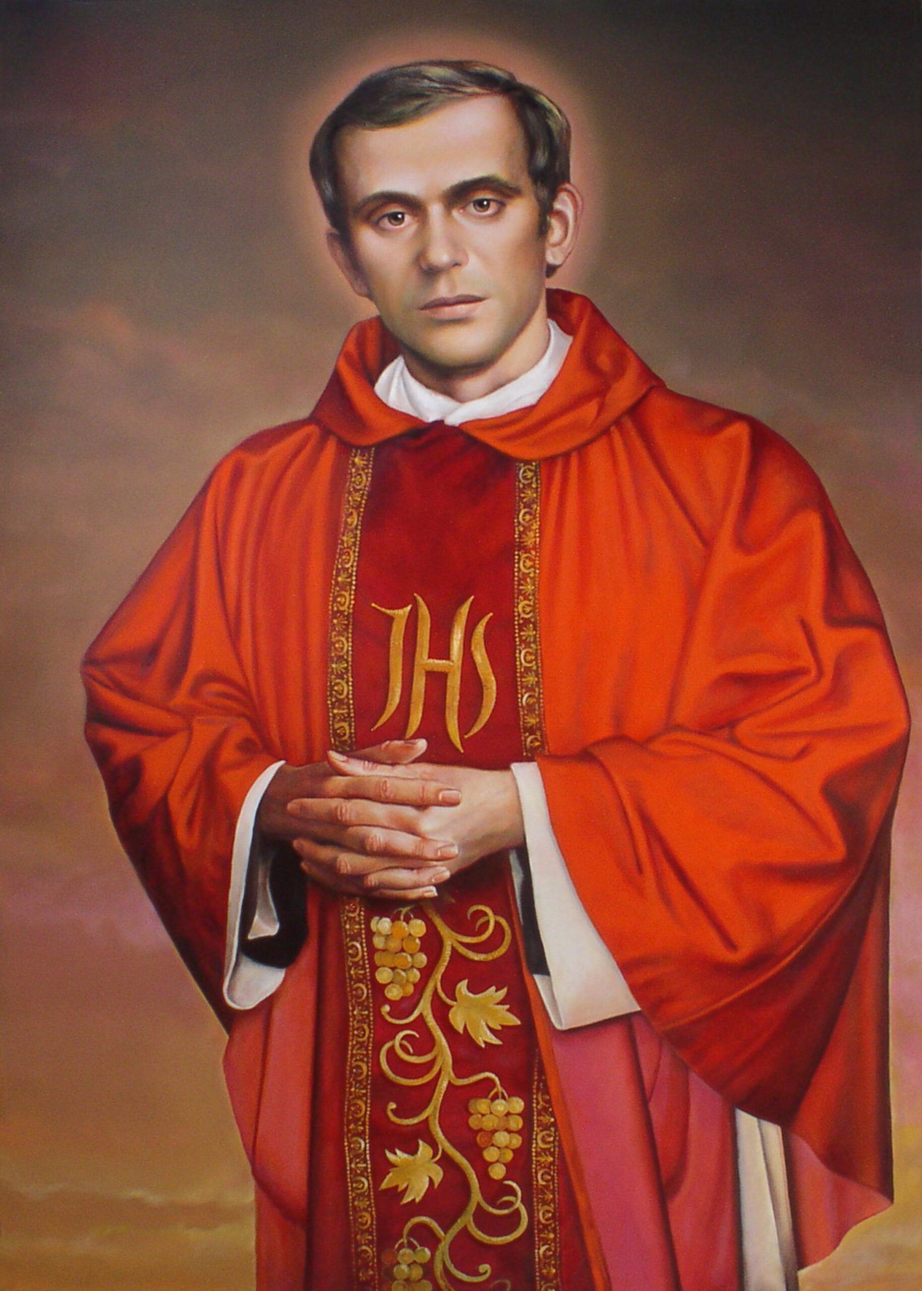 Na zdjęciu jest namalowany ksiądz Jerzy Popiełuszko w czerwonym ornacie